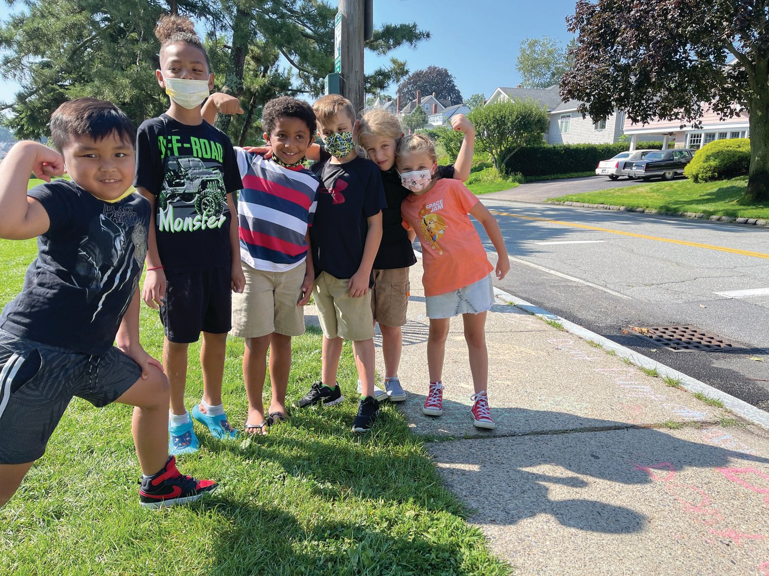 TEAM EFFORT: The youngest students in the STEM Advantage summer program gathered at Stillhouse Cove last week to celebrate the culmination of their six weeks of work, which included weekly gatherings at the cove. Some of the students tagged storm drains with chalk to help education passers-by about the dangers of pollution. Pictured, from left, are Ayden Barron, Kendriech Xayapanya. Matthew Holman, and Temperance, Minos and Emery Cleveland. (Herald photos by Daniel Kittredge) keychain